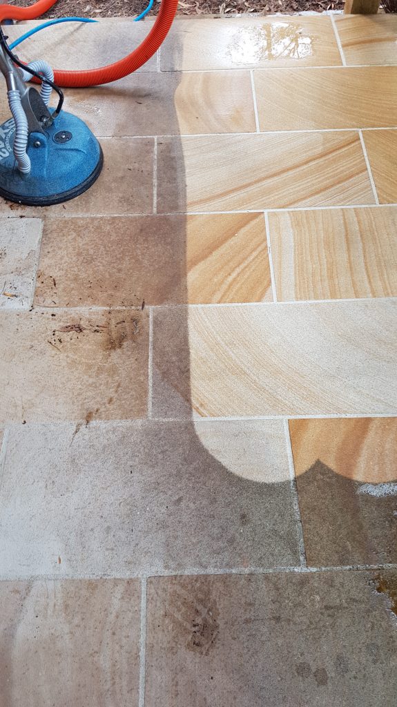 ile and grout cleaning in progress